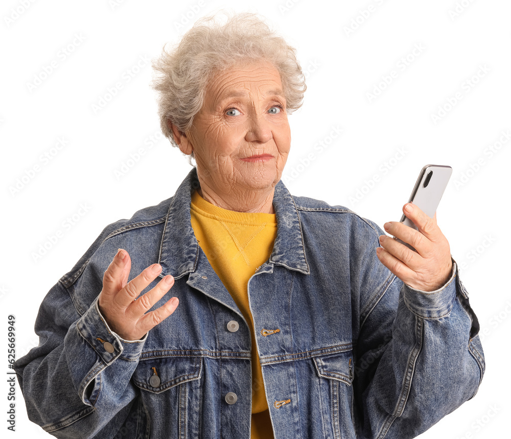 Wall mural Senior woman with mobile phone on white background