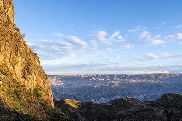 View from the landmark Muela del Diablo over the highest administrative capital, the vibrant city La Paz in Bolivia - traveling and exploring South America