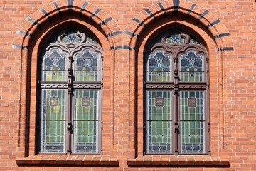 Fototapeta na wymiar Stained glass windows in the town hall in Chelmza.