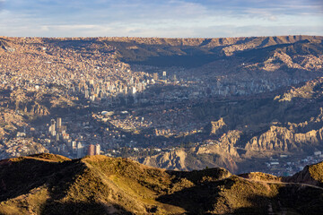 View from the landmark Muela del Diablo over the highest administrative capital, the vibrant city La Paz in Bolivia - traveling and exploring South America