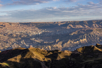 Fototapeta premium View from the landmark Muela del Diablo over the highest administrative capital, the vibrant city La Paz in Bolivia - traveling and exploring South America