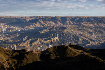 View from the landmark Muela del Diablo over the highest administrative capital, the vibrant city La Paz in Bolivia - traveling and exploring South America