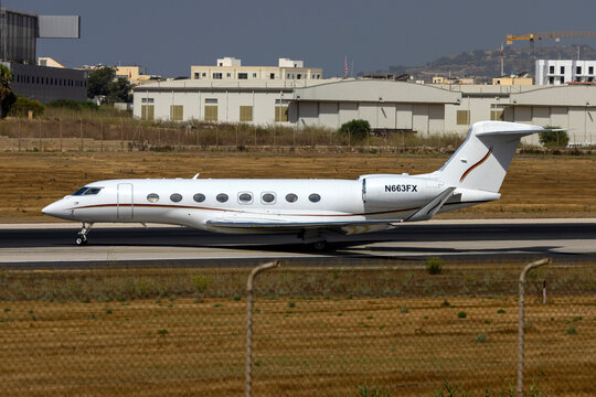 Luqa, Malta - July 20, 2023: Flexjet Gulfstream G650ER (REG: N663FX) lining up midway runway 31 for take off.