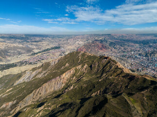 Aerial view from the impressive landmark Muela del Diablo down into the valley with the highest capital and vibrant city La Paz and El Alto, Bolivia