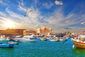 Harbour and boats in Alexandria near Qaitbay Citadel, famous view of Egypt