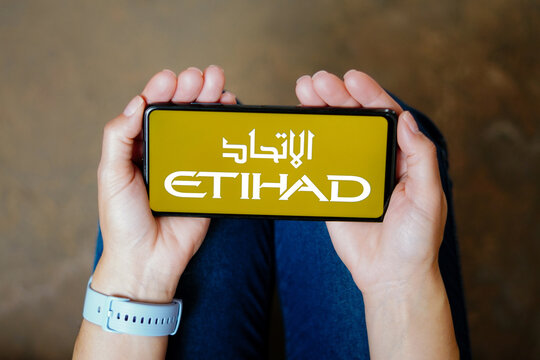 July 20, 2023, Brazil. In this photo illustration, the Etihad Airways logo seen displayed on a smartphone.