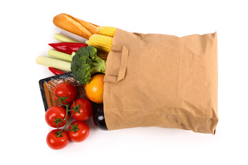 Paper bag with different products on white background. Grocery shopping concept