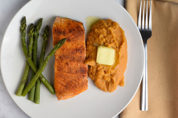 season salmon   with asparagus  and mashed sweet potato