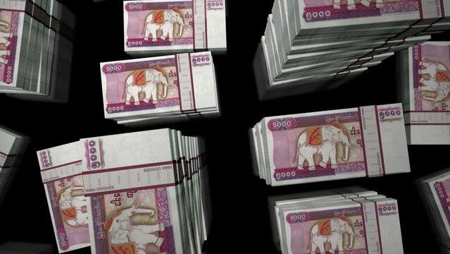Myanmar money Burma Kyat money pack loop. Flight over MMK banknotes stacks top view. 3d loopable seamless animation. Abstract background concept of economy, crisis, business and finance.