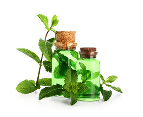 Bottles of essential oil and fresh mint isolated on white background