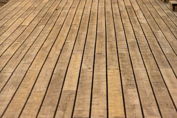 Wooden tree deck at a pier.