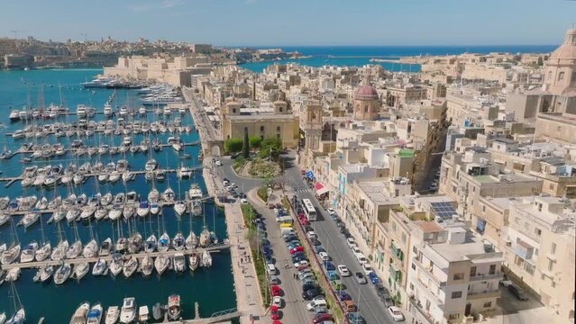Aerial view of famous maltese old city Birgu, marina, yachts, boats. Malta island