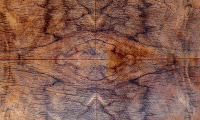 Old wood texture background with natural cracks. Dark brown wood plank is used for background.