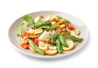 Plate of tasty pasta salad with peas and basil on white background