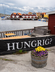 The Swedish word Hungrig in front of a snack restaurant in Kladesholmen. English translation:...