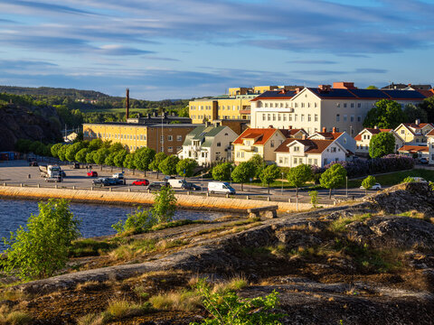Stromstad, Sweden - May 24, 2023: Golden hour view at the cityscape of the town of Stromstad at the lake Vanern in Sweden