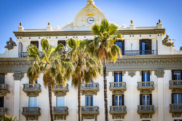 facade of historic building in bari, puglia, italy, south italy, europe, palm trees