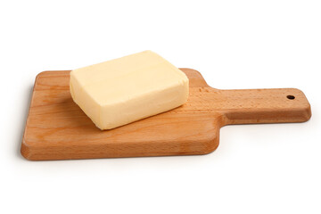 Wooden board with fresh butter on white background