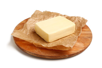 Wooden board with fresh butter on white background