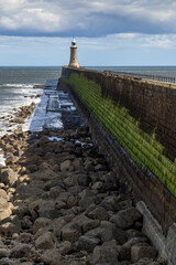 Tynemouth North Pier and Lighthouse at the mouth of the River Tyne,  taken on a sunny spring day.