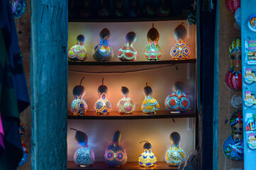 Colorful gourd lamp or calabash lamp for sale in shop. Decorative handcrafted interior light...