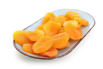 Plate with tasty dried apricots on white background