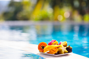 Tropical fruit at swimming pool