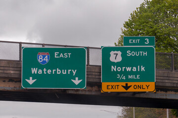 Exit 3 sign for US7 South toward Norwalk, Connecticut on Interstate 84 Yankee Expressway east toward Waterbury, Connecticut