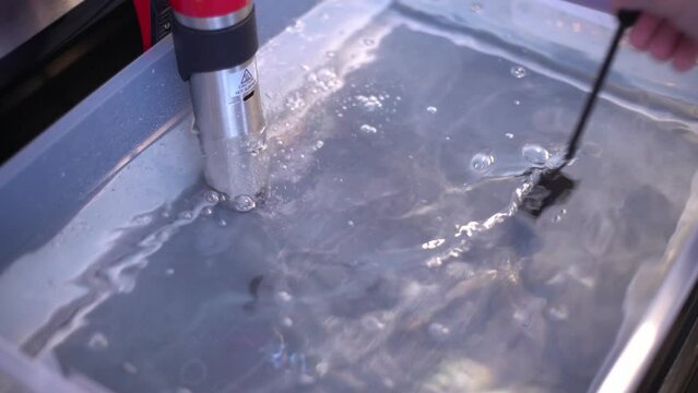 Prepping Water Bath for Film Development Chemicals