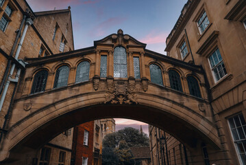 Fototapeta na wymiar Hertford Bridge, often called the Bridge of Sighs, is a skyway joining two parts of Hertford College, Oxford, England, UK