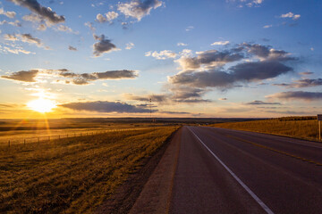 Fototapeta na wymiar sunset over the open road