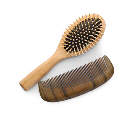 New wooden hair brush and comb on isolated white, top view