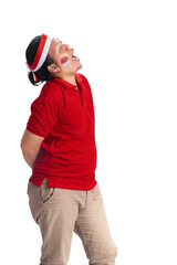 Indonesian men celebrate Indonesian independence day on 17 August with crackers eating competition