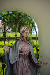  statue of our lady on glass case