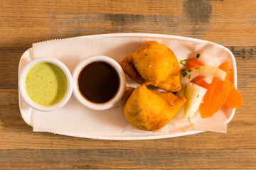 samosas with dipping sauces