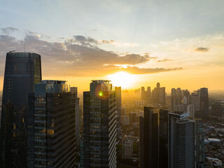 Fototapeta premium Jakarta city and skyscrapers at sunset. Urban landscape. Indonesia.