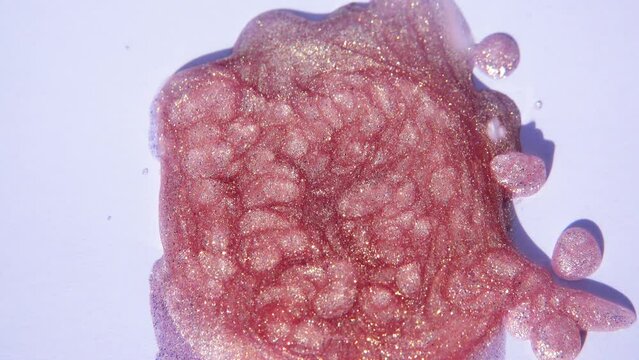 pink glitter nail polish spot