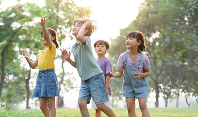 Obraz premium group image of cute asian children playing in the park