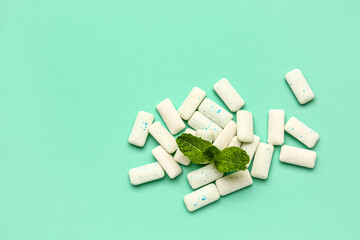 Fresh chewing gums with mint on turquoise background