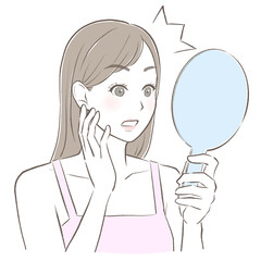 手鏡を見て嬉しくて驚く女性