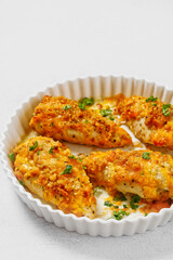 baked chicken breasts under cracker cheese crust
