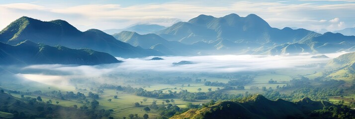 Fototapeta na wymiar Panoramic jungle landscape with mountains and mist. Rainforest aerial view. Beautiful fog in the morning.