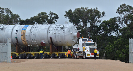 Huge vessels are transported to a Gas Conditioning plant at a Victorian refinery.