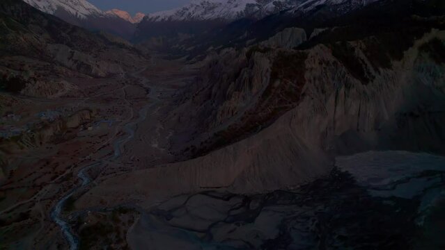 Aerial birds eye view valley with river stream and traditional manang village houses. Mamang district. Tilicho base camp trail. Himalayas mountains and trekking concept.