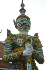Fototapeta premium white giant statue at Arun temple in landmark of Thailand