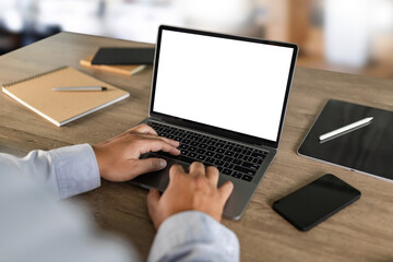 men using laptop computer working at office workspace with blank display white desktop screen...