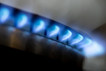 gas stove closeup - gas energy saving concept, energy crisis