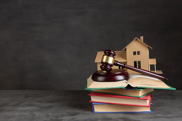 House model, gavel and books on the desk, Real property law concept, real estate auction - 625778703