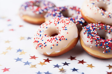 Glazed sweet donuts with stars decoration on white background with stars. American independence day, celebration, patriotism and holidays concept. - Powered by Adobe
