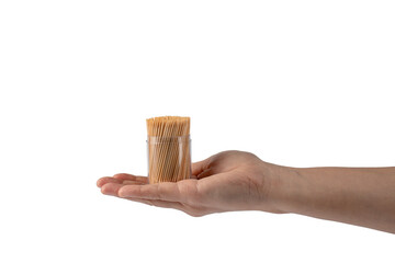 Hand with a toothpick isolated on transparent background - obrazy, fototapety, plakaty